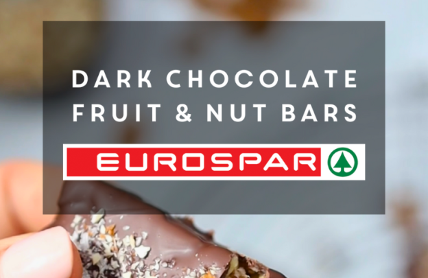 Image of dark chocolate bar with chopped nuts on top that has text over it Dark Chocolate Fruit and Nut Bars and then the EUROSPAR logo